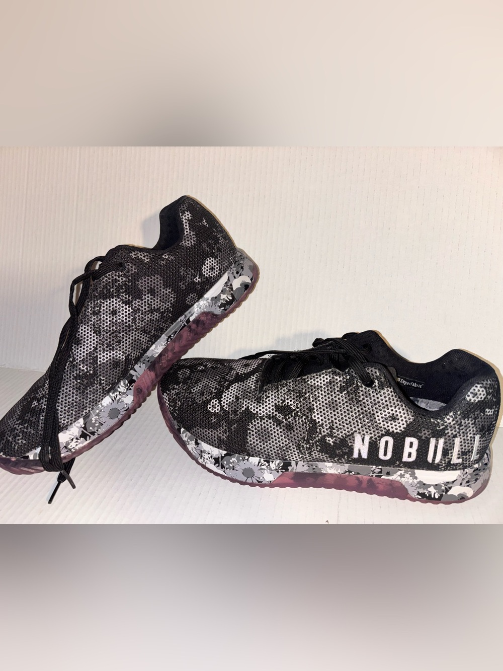 NOBULL Black and White Camo Cross-Training Shoes with Maroon Soles
Men size 11.5